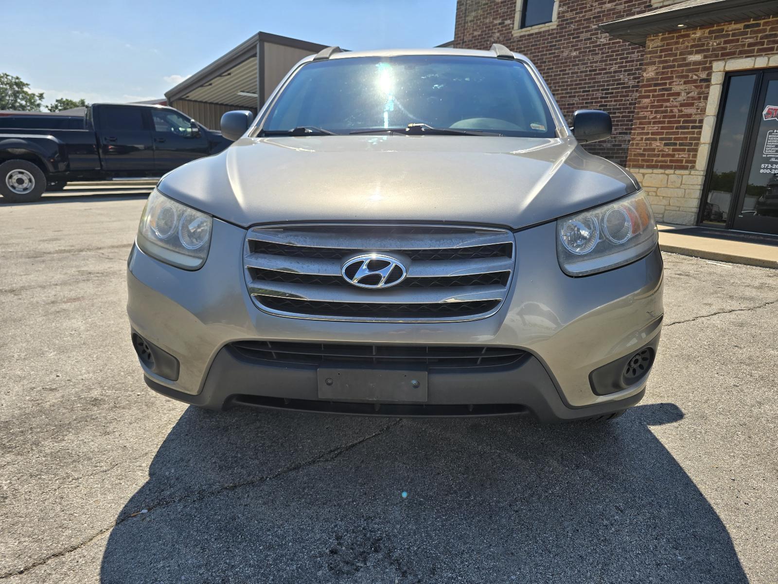 hyundai santa fe 2012 5XYZGDAG1CG169738 image hyundai santa fe 2012 5XYZGDAG1CG169738 image